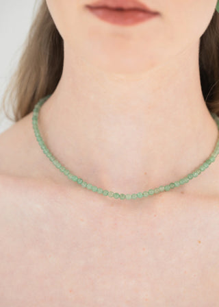 Timeless Jennifer Behr necklace with artisanal craftsmanship and graceful neckline contouring design