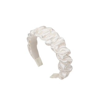 Headband with a voluminous ruffle, designed for a sculptural, elegant silhouette perfect for brides