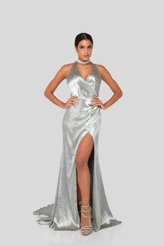 Luxury wrap evening gown with plunging halter neckline, sleeveless design, high slit, and fluid draping for a glamorous fit
