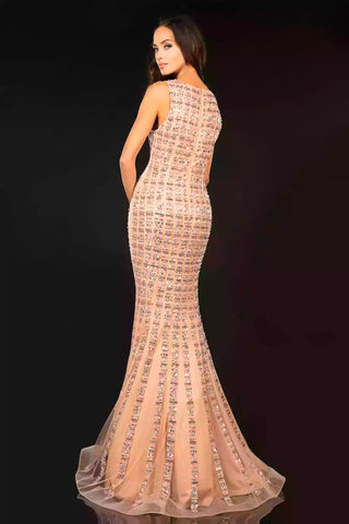 Woman wearing a sparkling evening gown against a dark background