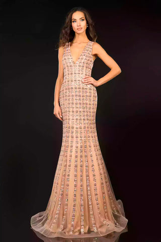 Woman wearing a beaded evening gown against a black background