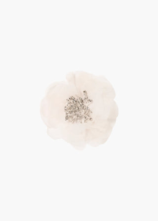 Structured floral hairpiece with layered silk petals and crystal detailing, perfect for couture bridal looks