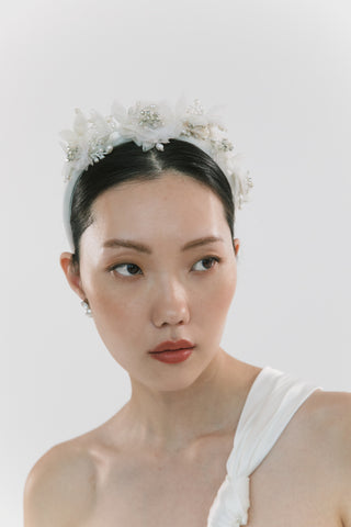 Handcrafted headband with delicate organza flowers, accented with luminous baroque pearls and vintage-inspired details