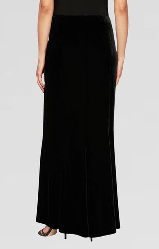 Formal velvet skirt featuring column fit with dramatic fishtail back, designed for timeless sophistication at special occasions