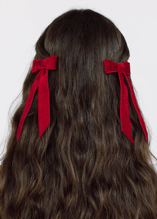 Back view of model with Velvet Bow Barrette in Rouge – classic hair styling