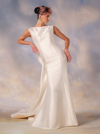 Viktor&Rolf couture mermaid gown in lustrous Mikado with artisanal sculpted back, bespoke craftsmanship, and exclusive luxury bridal design heritage