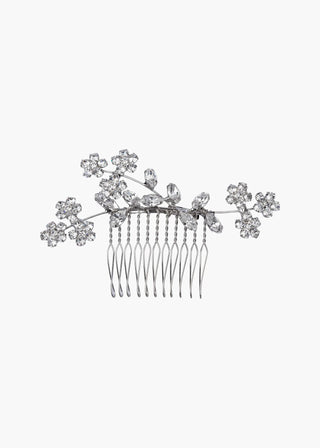 Crystal-embellished bridal comb with sculptural floral silhouette and couture detailing