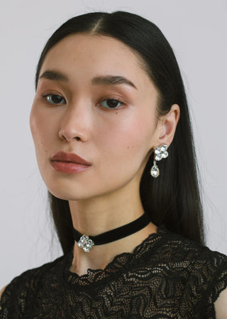 Model wearing Thea Ribbon Tie in Crystal – sophisticated accessory styled around the neck for a chic look