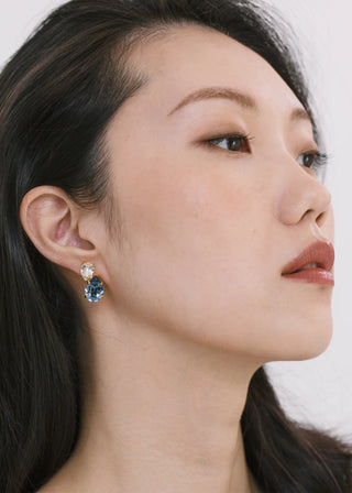 Elegant statement earrings with a bold asymmetrical design, perfect for evening wear