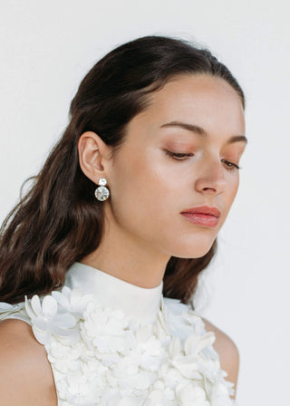 Model wearing Crystal Myrla Earrings – timeless elegance with clear gems