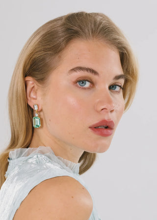 Evening-ready earrings showcasing architectural crystal cuts and fine artisan craftsmanship