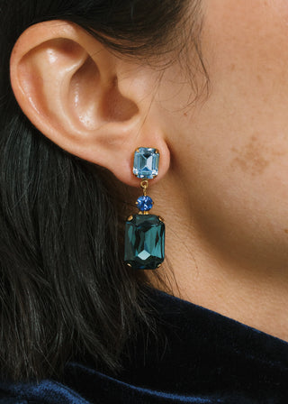 Model wearing Justine Earrings – elegant drop earrings with sparkling crystals in complementary hues