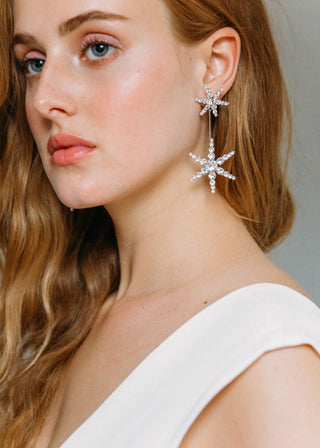 Model wearing Estee Earrings – elegant star-shaped earrings adding sparkle to any outfit