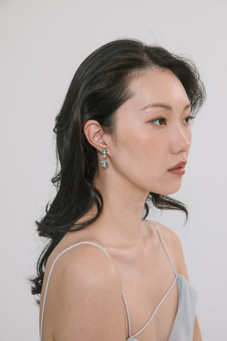 Minimalist yet striking crystal earrings, offering a touch of brilliance for special events and luxury moments