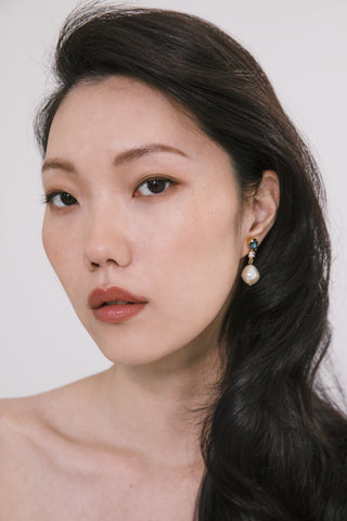 Elegant statement earrings with geometric crystal cluster and graceful baroque drop pearl accent
