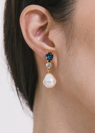 Handcrafted statement earrings featuring a mix of pear-shaped crystals and luminous baroque pearls