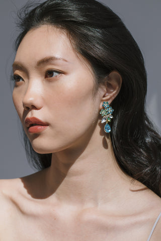 Handcrafted crystal earrings with floral silhouette, adding elegance and glamour to evening attire