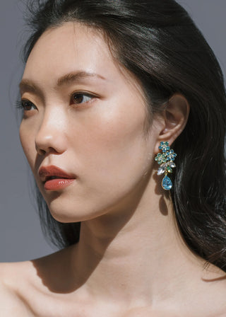 Exquisite statement earrings with a dynamic floral design, ideal for formal events and luxury gifting