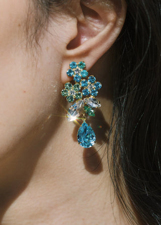 Glamorous crystal earrings with intricate floral detailing, perfect for high-fashion occasions