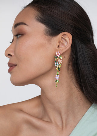 Luxury designer jewelry with high-shine floral elements and graceful drop design