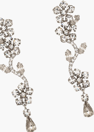 Close-up view of the Dania Earrings showcasing intricate crystal details and the floral-inspired design