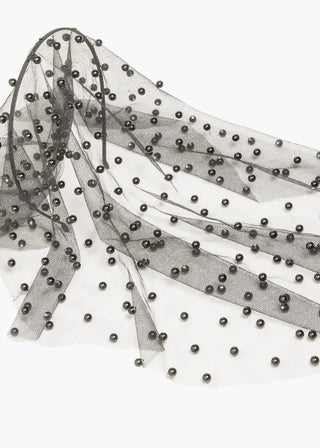 Close-up of the Chiara Veil, highlighting the intricate hand-stitched pearl accents on the mesh.