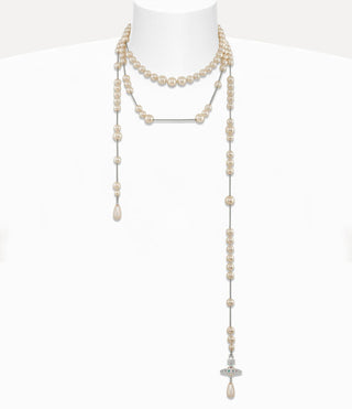Silver-tone Broken Pearl necklace displayed on a mannequin, emphasizing its timeless elegance and design.