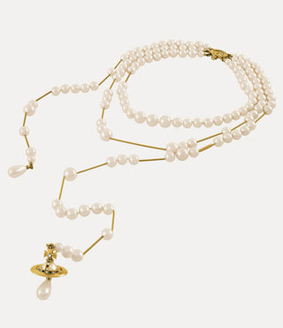 Close-up of the gold-tone Broken Pearl necklace highlighting the multi-colored Swarovski crystals and broken effect.