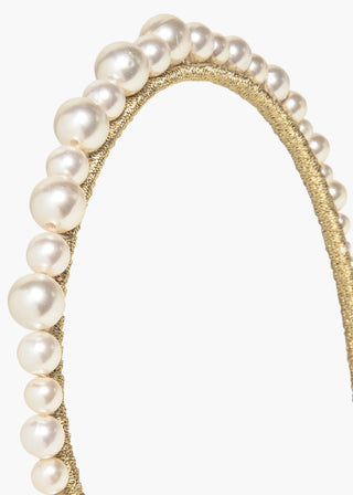 Close-up of the Belladonna Headband, highlighting the delicate gold wire design intertwined with artfully arranged Czech pearls, capturing the understated luxury of the accessory.