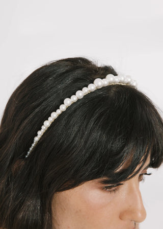 Elegant Belladonna Headband featuring a gold-wrapped band adorned with hand-wired Czech pearls of varying sizes, showcasing its organic texture against a soft backdrop.