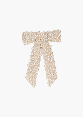 Donna Bow Barrette on a white background, capturing the texture and variety of pearl sizes.