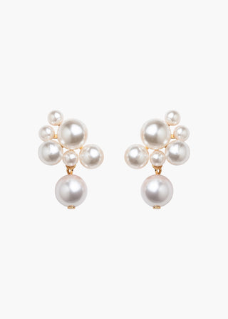 Perlita Earrings displayed on a white background, showcasing their elegant design with crystal pearls and 18K gold plated brass.