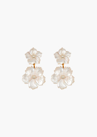 Tibby Earrings displayed on a plain white background, highlighting the intricate mother of pearl flowers and pearl centers.