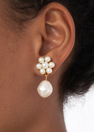 Handcrafted designer earrings with a clustered silhouette and statement drop, perfect for luxury accessorizing and formal occasions.