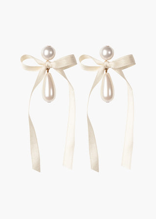 Elongated designer earrings with handcrafted crystal pearls and couture-inspired silk ribbon detailing