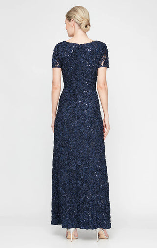 Formal soutache lace dress featuring scoop illusion neckline, short sleeves, and flowing tailored silhouette