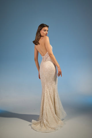 Mermaid-style bridal dress featuring a scoop neckline, spaghetti straps, and intricate beading, crafted for a stunning wedding look.