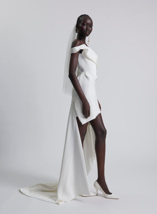 Vivienne Westwood exclusive bridal gown blending modern glamour with couture draping and British artisanal heritage in silk cady