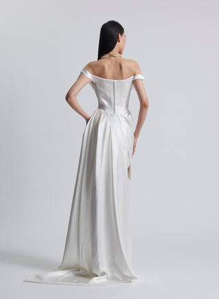 Vivienne Westwood luxury wedding dress featuring artisanal draping, asymmetric hemline, and British couture craftsmanship
