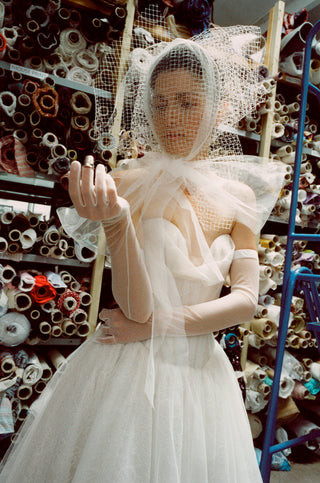 Vivienne Westwood made-to-order lace and tulle wedding dress showcasing British craftsmanship and timeless couture-inspired design