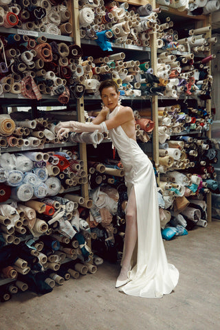 Vivienne Westwood made-to-order silk satin gown with sculptural halter design and heritage-inspired artisanal detailing

