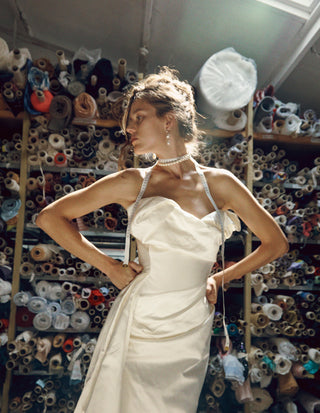 Vivienne Westwood made-to-order bridal dress in ivory Lux duchesse highlighting artisanal detailing and timeless British elegance