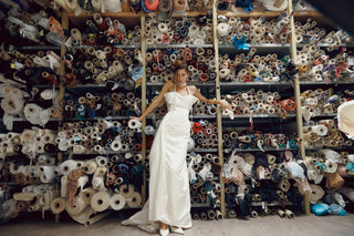 Vivienne Westwood made-to-order gown crafted in silk-blend duchesse satin with sculpted bust folds and dramatic full skirt