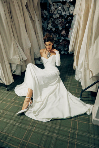 Vivienne Westwood made-to-order wedding dress in ivory silk cady showcasing signature draping and artisanal craftsmanship