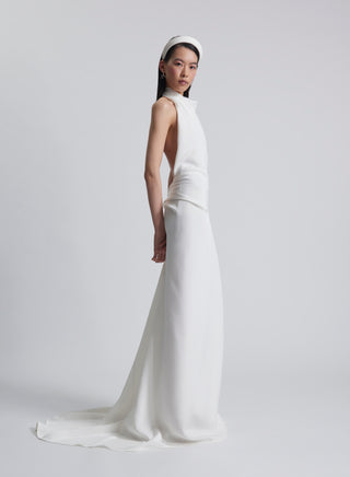 Vivienne Westwood luxury made-to-order bridal dress with sculptural train and iconic British craftsmanship details.