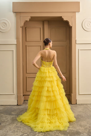 Designer evening dress with a voluminous tulle silhouette, plunging neckline, and structured details for a glamorous touch.