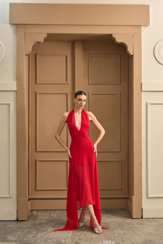 Graceful midi dress with an asymmetrical hemline, offering fluid movement and a refined silhouette for special occasions.