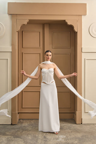 Luxurious corset-skirt wedding dress with a sculpted sweetheart neckline and structured boning for a regal bridal look.