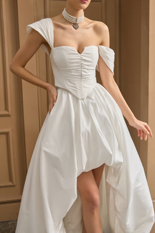 Chic off-the-shoulder corset topper with a structured taffeta bodice, designed to add refinement to any bridal ensemble.