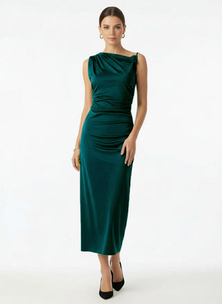 Woman wearing a green dress on a white background